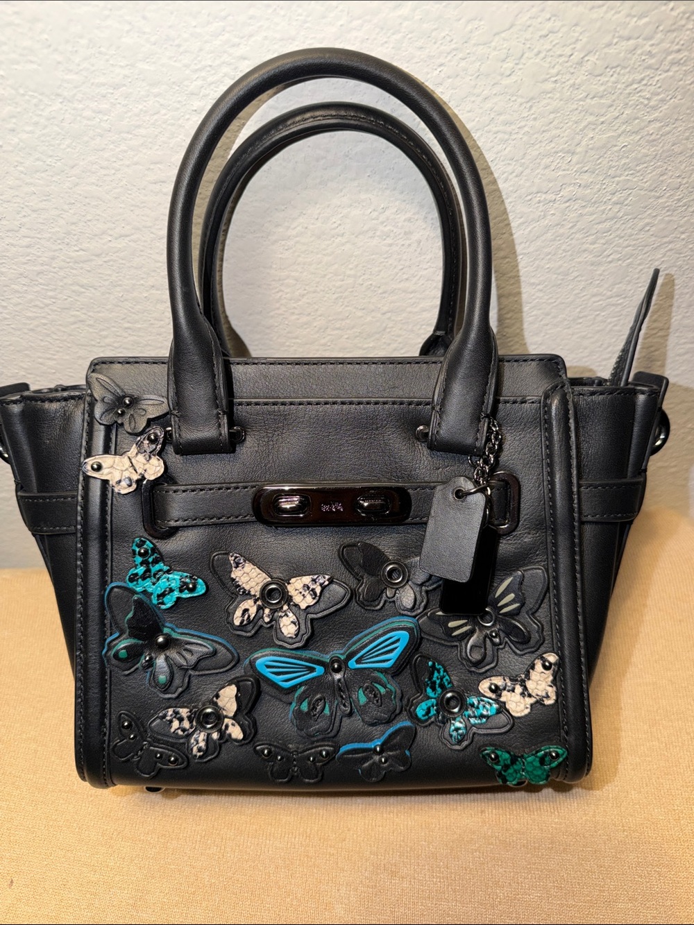 Coach NWOT Black Leather Butterfly Embellished Swagger 21 Carryall Bag - Picture 4 of 11